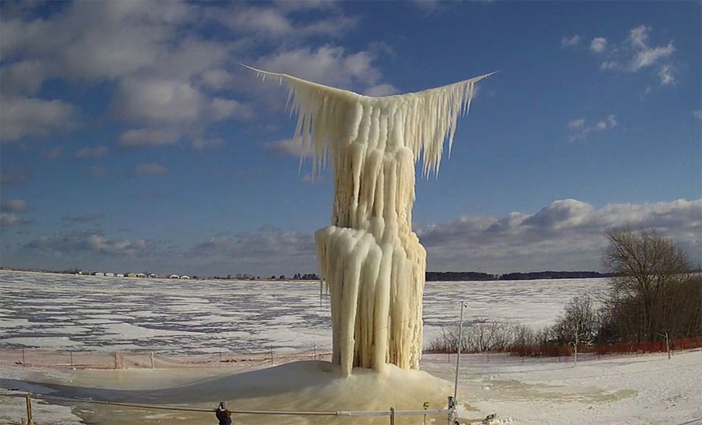 Six-Story Ice Sculpture Collapses On Shore Of Lake Superior